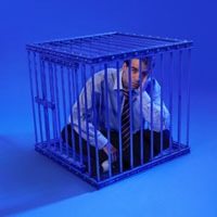 Picture of sitting caged executive